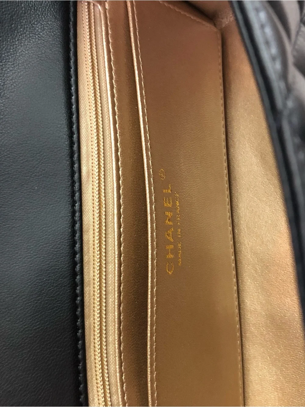 CHANEL Black Quilted Lambskin Mini Flap Bag with Gold Chain